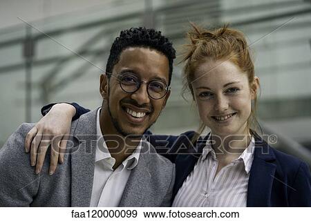 Couple standing outdoors View Large Photo Image Stock Photo - Couple standing outdoors. Fotosearch