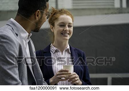 Couple talking outdoors View Large Photo Image Stock Image - Couple talking outdoors. Fotosearch