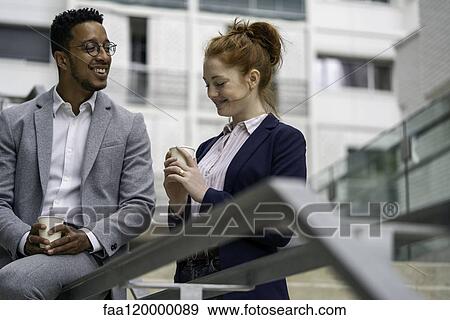 Stock Photo - Couple talking outdoors. Fotosearch