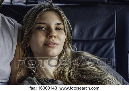 Couple traveling in car View Large Photo Image Stock Image - Couple traveling in car. Fotosearch
