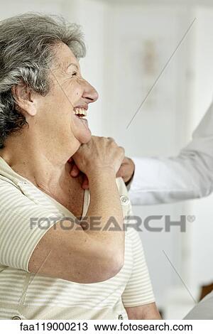 Doctor consoling senior woman View Large Photo Image Stock Image - Doctor consoling senior woman. Fotosearch