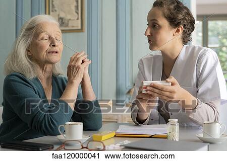 Doctor talking with patient View Large Photo Image Stock Image - Doctor talking with patient. Fotosearch