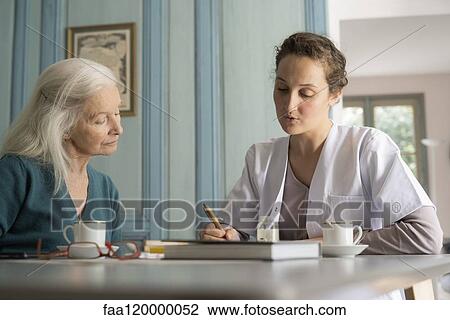 Doctor writing medical history View Large Photo Image Stock Image - Doctor writing medical history. Fotosearch