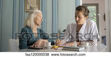 Doctor writing medical history View Large Photo Image Stock Photo - Doctor writing medical history. Fotosearch
