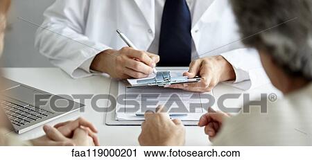 Doctor writing prescription View Large Photo Image Stock Image - Doctor writing prescription. Fotosearch