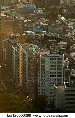 Elevated view of cityscape at sunset View Large Photo Image Stock Photo - Elevated view of cityscape at sunset. Fotosearch
