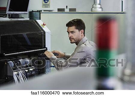 Engineer using computer View Large Photo Image Stock Image - Engineer using computer. Fotosearch