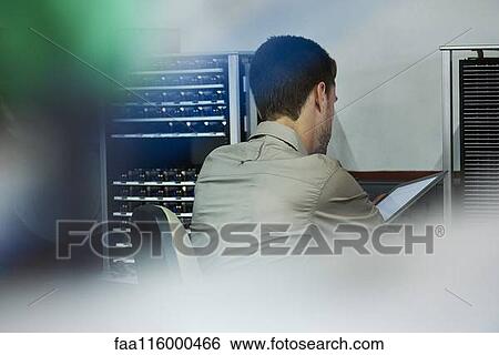 Engineer using digital tablet View Large Photo Image Stock Photograph - Engineer using digital tablet. Fotosearch