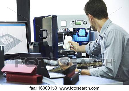Engineer working in office View Large Photo Image Stock Image - Engineer working in office. Fotosearch