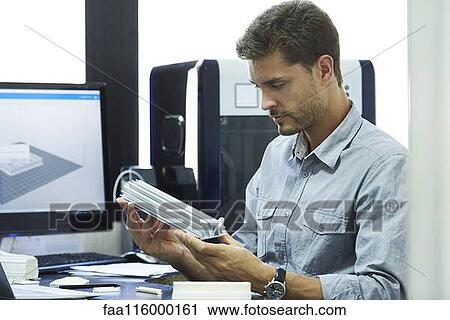 Engineer working in office View Large Photo Image Stock Image - Engineer working in office. Fotosearch