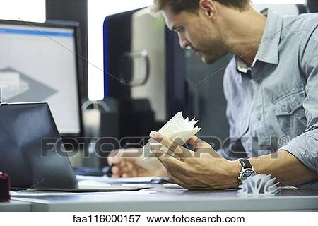 Engineer working in office View Large Photo Image Stock Photo - Engineer working in office. Fotosearch