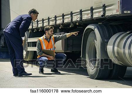 Examining lorry View Large Photo Image Stock Photo - Examining lorry. Fotosearch
