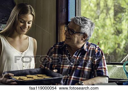 Father talking with his daughter at home View Large Photo Image Picture - Father talking with his daughter at home. Fotosearch