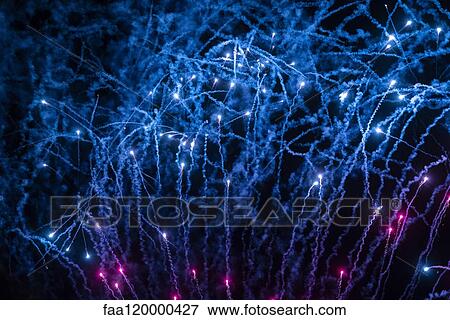 Fireworks display in sky View Large Photo Image Stock Photo - Fireworks display in sky. Fotosearch