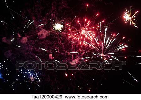 Fireworks display in sky View Large Photo Image Stock Photo - Fireworks display in sky. Fotosearch