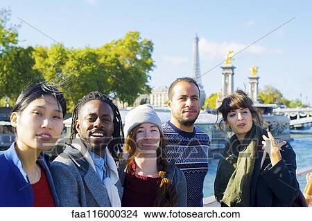 Friends standing together in boat View Large Photo Image Picture - Friends standing together in boat. Fotosearch