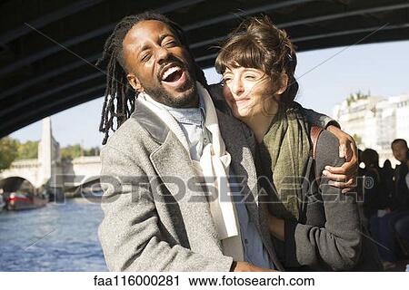 Friends standing together in boat View Large Photo Image Stock Image - Friends standing together in boat. Fotosearch