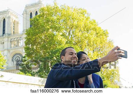 Friends taking selfie in boat View Large Photo Image Stock Photograph - Friends taking selfie in boat. Fotosearch