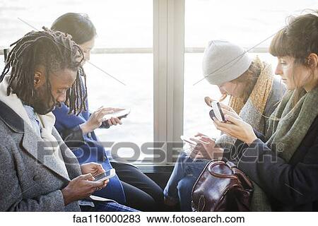 Friends traveling together in boat View Large Photo Image Stock Image - Friends traveling together in boat. Fotosearch