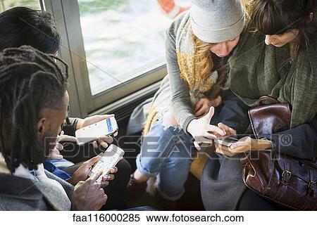 Friends traveling together in boat View Large Photo Image Stock Photography - Friends traveling together in boat. Fotosearch