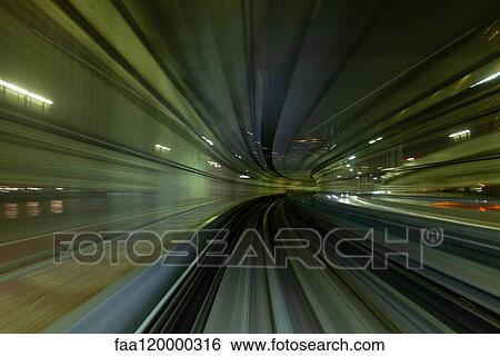 High speed train moving in city View Large Photo Image Stock Photograph - High speed train moving in city. Fotosearch