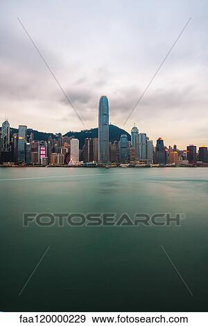 Hong Kong financial district at dusk View Large Photo Image Stock Photo - Hong Kong financial district at dusk. Fotosearch