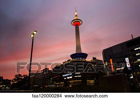 Kyoto Tower and downtown district at dusk View Large Photo Image Picture - Kyoto Tower and downtown district at dusk. Fotosearch