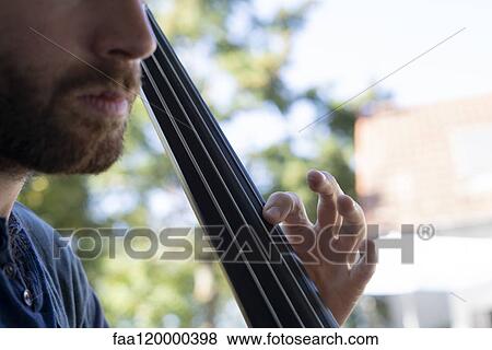 Man playing violas View Large Photo Image Stock Photo - Man playing violas. Fotosearch
