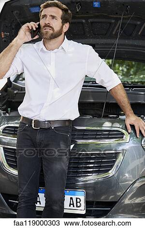 Man talking on mobile phone View Large Photo Image Stock Image - Man talking on mobile phone. Fotosearch