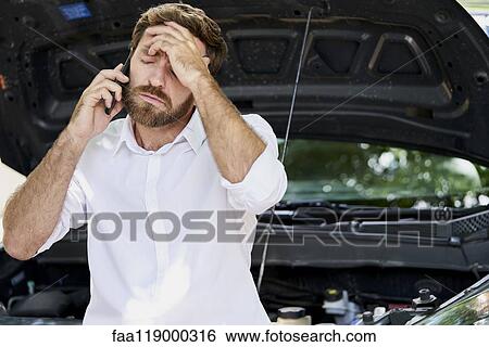 Man talking on mobile phone View Large Photo Image Stock Photograph - Man talking on mobile phone. Fotosearch