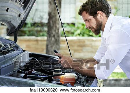 Man using smartphone View Large Photo Image Stock Image - Man using smartphone. Fotosearch