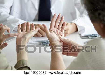 Mother and daughter sitting in clinic View Large Photo Image Stock Photo - Mother and daughter sitting in clinic. Fotosearch