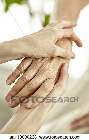 Nurse holding patient's hand View Large Photo Image Stock Image - Nurse holding patient's hand. Fotosearch