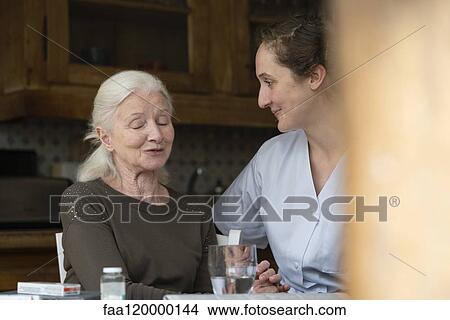 Nurse talking with patient View Large Photo Image Picture - Nurse talking with patient. Fotosearch