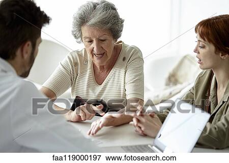 Patient talking with doctor View Large Photo Image Stock Photo - Patient talking with doctor. Fotosearch