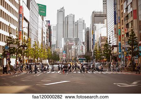 People walking on pedestrian crossing in tokyo View Large Photo Image Stock Image - People walking on pedestrian crossing in tokyo. Fotosearch