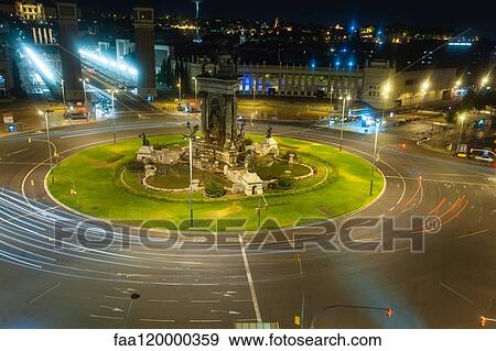 Plaza Espana roundabout light trails View Large Photo Image Stock Photo - Plaza Espana roundabout light trails. Fotosearch