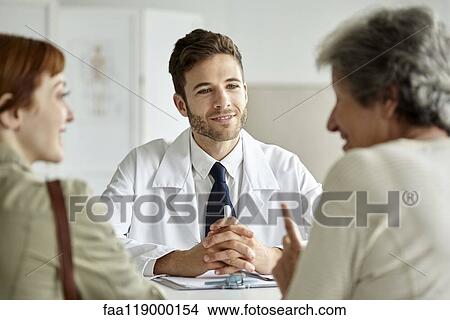 Senior patient talking with doctor View Large Photo Image Picture - Senior patient talking with doctor. Fotosearch