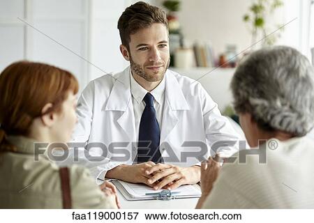 Senior patient talking with doctor View Large Photo Image Stock Photo - Senior patient talking with doctor. Fotosearch