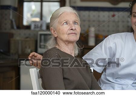 Senior woman squinting eyes View Large Photo Image Stock Image - Senior woman squinting eyes. Fotosearch