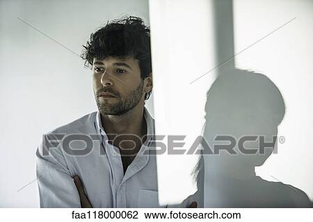 Serious business people looking away View Large Photo Image Stock Image - Serious business people looking away. Fotosearch