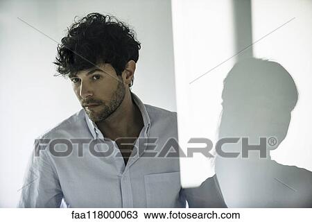 Serious business people looking away View Large Photo Image Stock Image - Serious business people looking away. Fotosearch