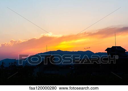 Silhouetted mountains during sunset View Large Photo Image Stock Image - Silhouetted mountains during sunset. Fotosearch