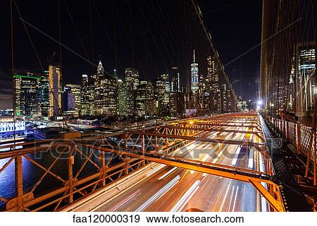 Traffic on Brooklyn Bridge at night View Large Photo Image Stock Photo - Traffic on Brooklyn Bridge at night. Fotosearch