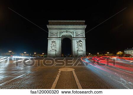 View of Arc de Triomphe at night View Large Photo Image Stock Image - View of Arc de Triomphe at night. Fotosearch
