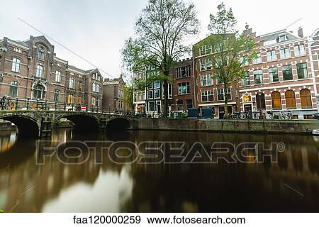 View of bridge over river in City View Large Photo Image Stock Photo - View of bridge over river in City. Fotosearch