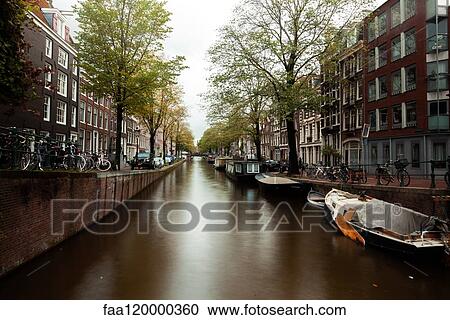 View of canal in Amsterdam View Large Photo Image Stock Image - View of canal in Amsterdam. Fotosearch