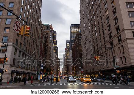 View of city street at dusk View Large Photo Image Stock Photograph - View of city street at dusk. Fotosearch