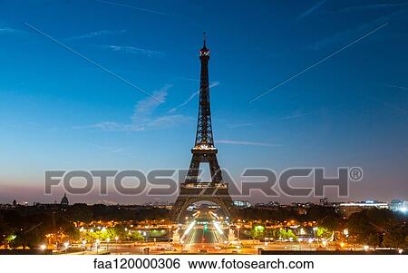 View of Eiffel Tower at dusk View Large Photo Image Stock Photograph - View of Eiffel Tower at dusk. Fotosearch