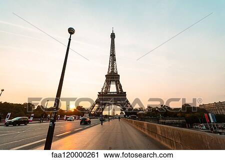 View of Eiffel Tower at sunset View Large Photo Image Stock Image - View of Eiffel Tower at sunset. Fotosearch
